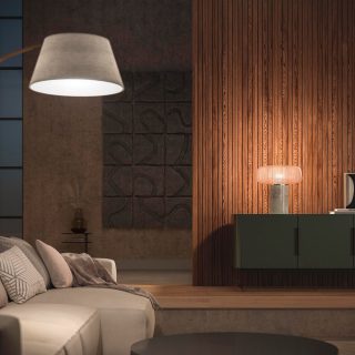 Un salón iluminado con suaves tonos primaverales de rosa, púrpura y luz blanca.