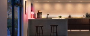 A kitchen counter lit in bright white tones of smart light.
