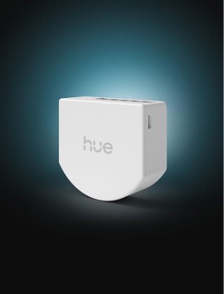 A Philips Hue wired on/off relay smart switch module in white