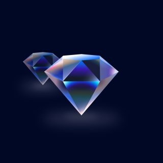 Two faceted diamond shapes with blue and purple reflections on a dark background.