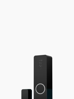 Compact black contact sensor with rectangular shape, matte finish, circular marking, and ""hue"" text engraved on the surface.