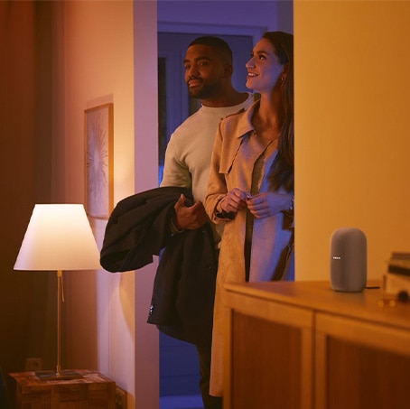 Couple entering home