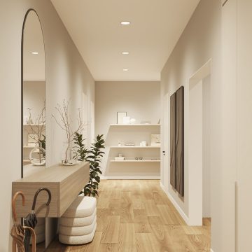 Ceiling-mounted recessed lights illuminate a hallway with light wood flooring, shelves, and neutral-toned decor.