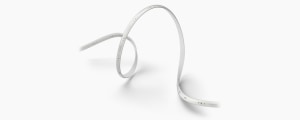 Flexible lightstrip in a white finish, featuring a slim, elongated shape with visible LED segments and printed text along the strip.