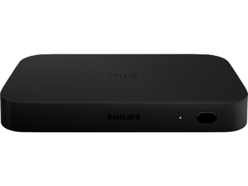 Black rectangular sync box with matte finish, rounded edges, visible button, small indicator light, and embossed ""hue"" on top.