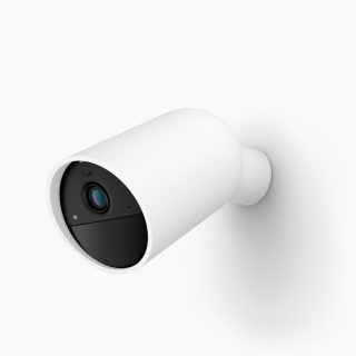 Smart security battery camera in a cylindrical shape, white matte finish, with a visible black lens and front panel.
