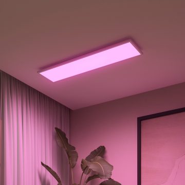 Un panneau lumineux LED rectangulaire Hue Surimu réglé sur une lumière connectée rose.
