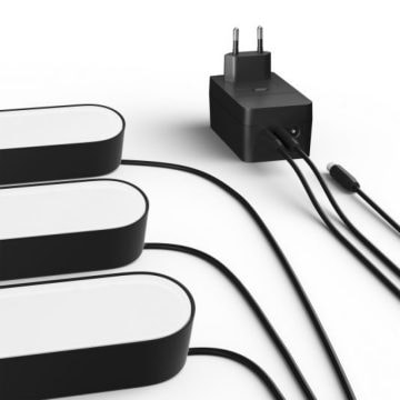 Un pack de trois Hue Play light bars noires avec câbles et bloc d'alimentation